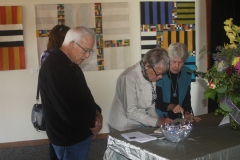 Signing the guest book